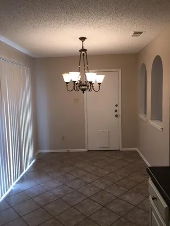a view of a chandelier in a room