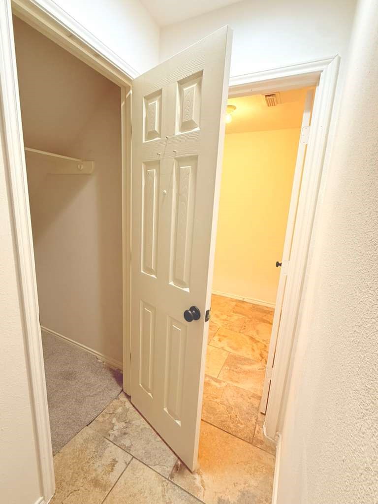 1011 Backland Court Spring, TX 77373 - Photo 26 of 35 a view of a bathroom with a door