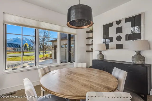 a spacious bedroom with a bed and a couch