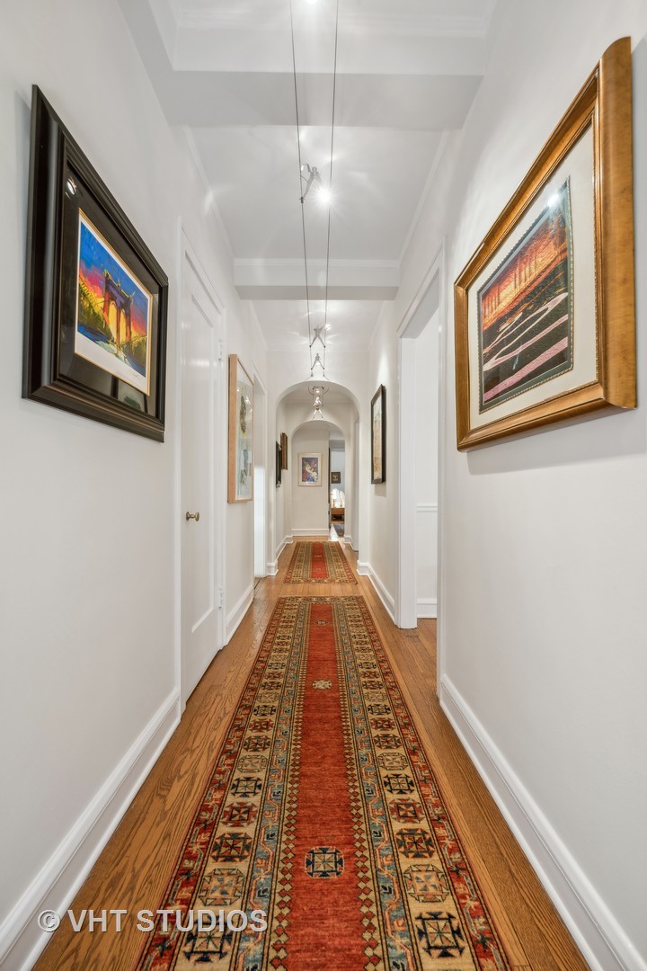1426 Chicago Avenue, Unit 2N Evanston, IL 60201 - Photo 13 of 32 a view of hallway with wooden floor