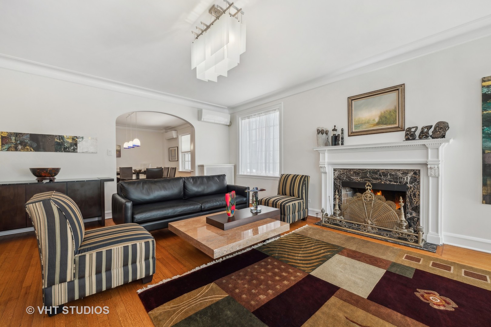1426 Chicago Avenue, Unit 2N Evanston, IL 60201 - Photo 6 of 32 a living room with furniture and a fireplace