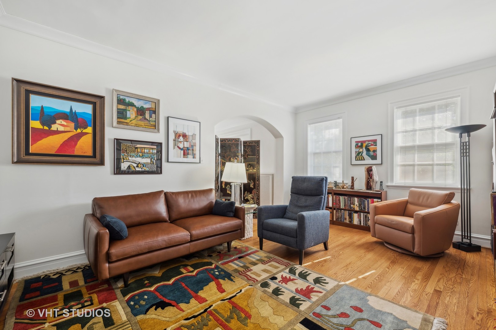 1426 Chicago Avenue, Unit 2N Evanston, IL 60201 - Photo 7 of 32 a living room with furniture and a flat screen tv