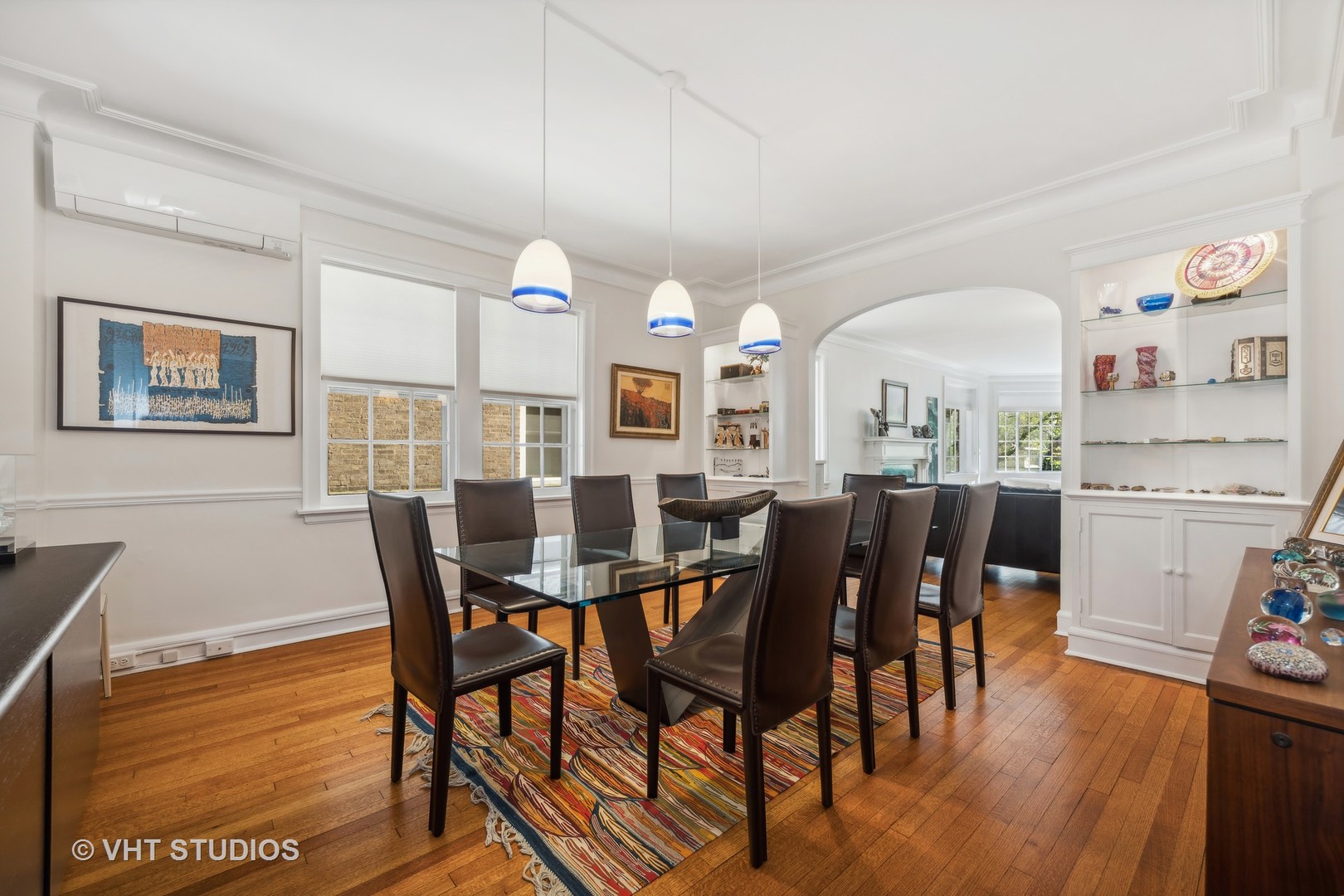 1426 Chicago Avenue, Unit 2N Evanston, IL 60201 - Photo 8 of 32 a view of a dining room with furniture and wooden floor