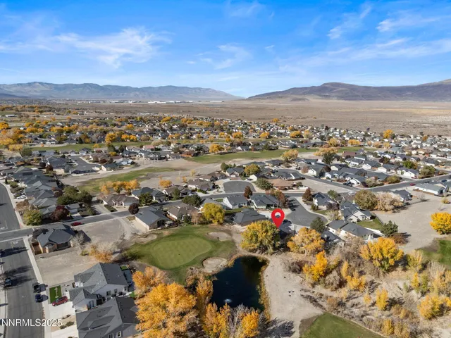 an aerial view of residential house with outdoor space and river
