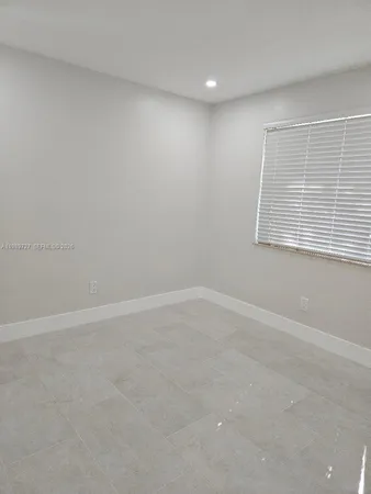 a bathroom with a sink a toilet and a bathtub