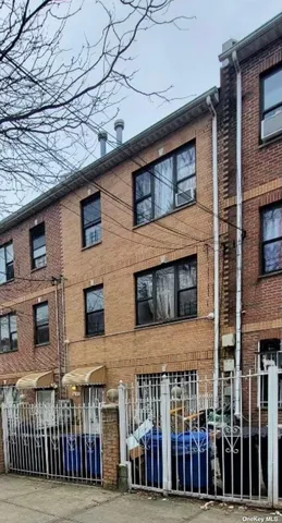 a front view of a house with a glass windows
