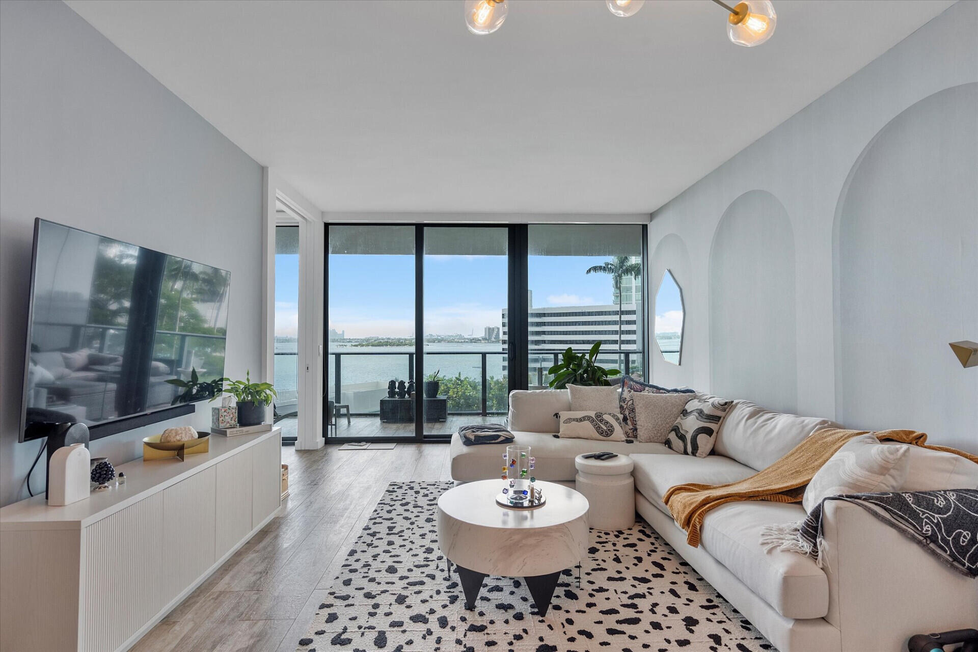 650 Northeast 32nd Street, Unit 606 Miami, FL 33137 - Photo 16 of 24 a living room with furniture and a large window