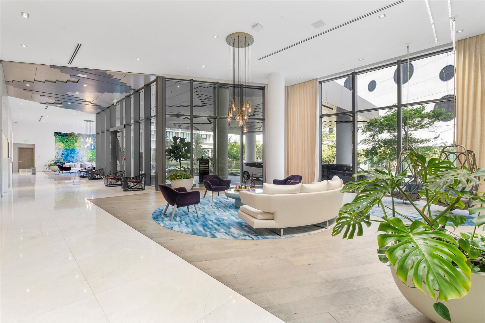 650 Northeast 32nd Street, Unit 606 Miami, FL 33137 - Photo 17 of 24 a living room with patio area