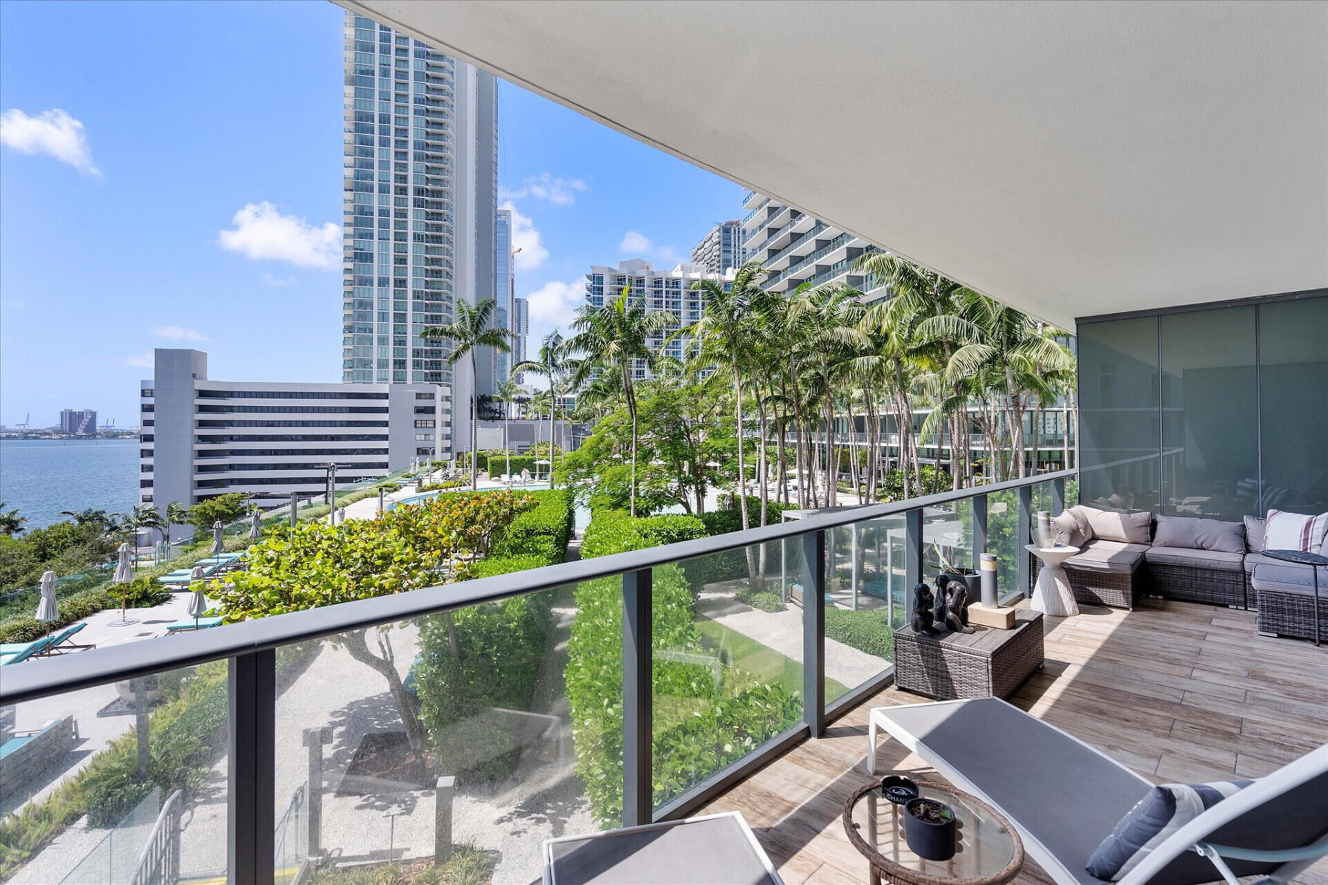 650 Northeast 32nd Street, Unit 606 Miami, FL 33137 - Photo 18 of 24 a view of a balcony with two chairs and a table