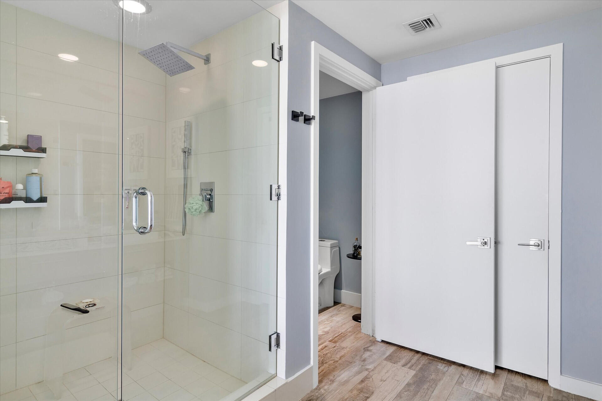 650 Northeast 32nd Street, Unit 606 Miami, FL 33137 - Photo 23 of 24 a bathroom with a shower and a glass door