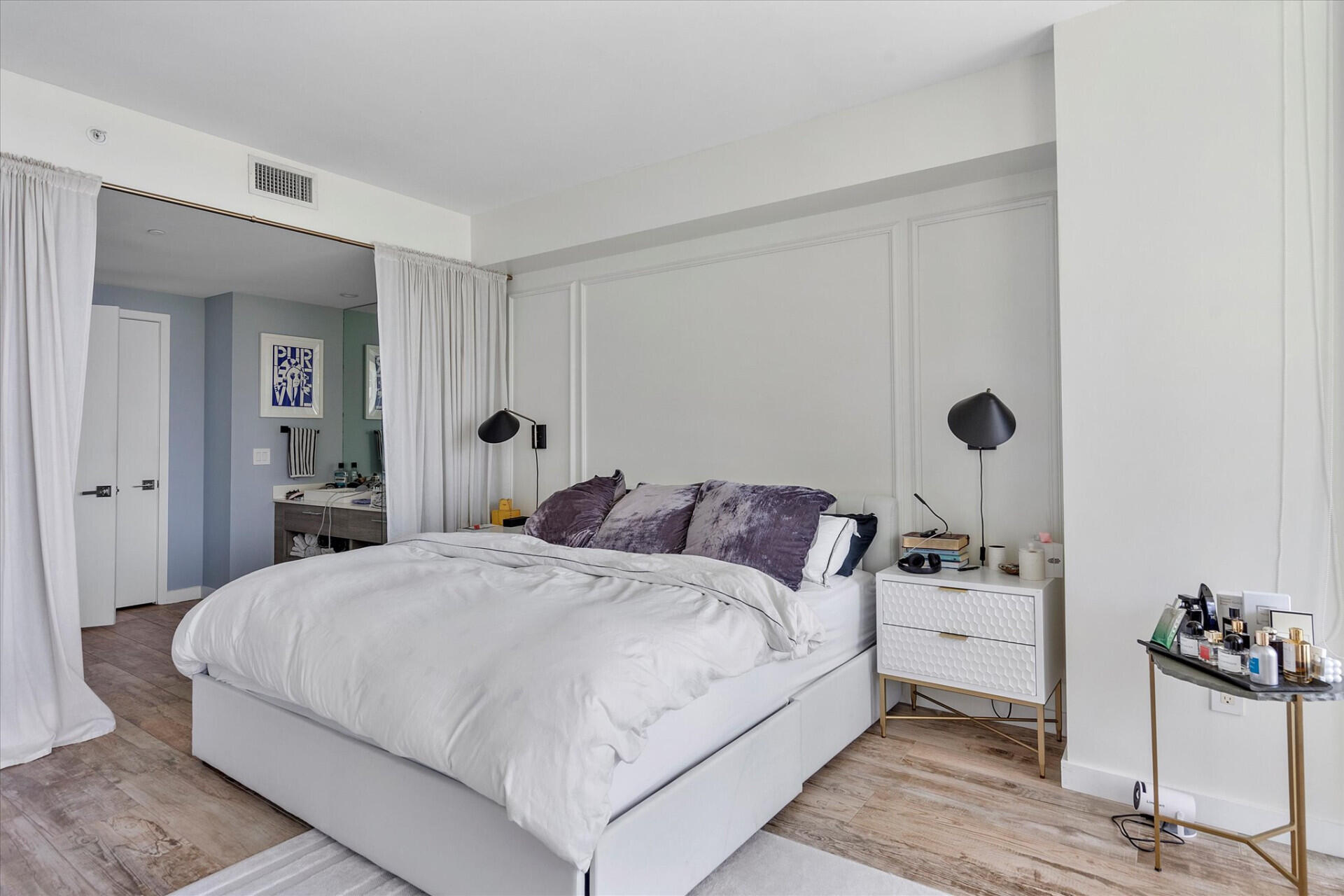 650 Northeast 32nd Street, Unit 606 Miami, FL 33137 - Photo 9 of 24 a bedroom with a bed and dresser