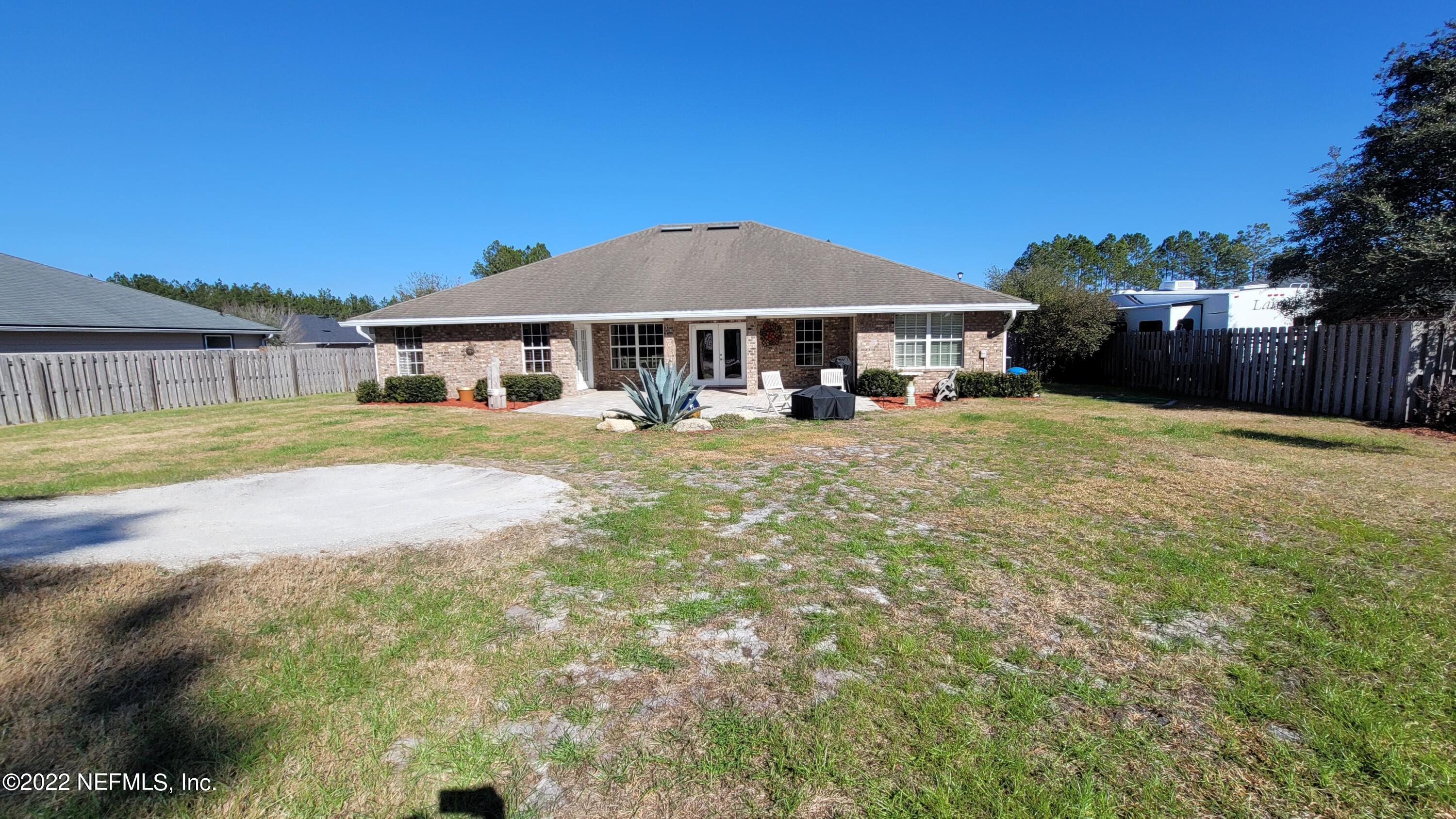 2867 Longleaf Ranch Circle Middleburg, FL 32068 - Photo 26 of 33 a view of a house with a yard