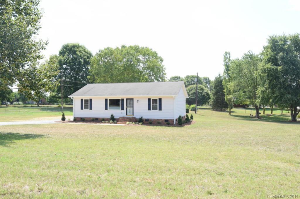 2112 Quail Ridge Road Monroe, NC 28110 - Photo 1 of 14 a view of a house with pool and a yard