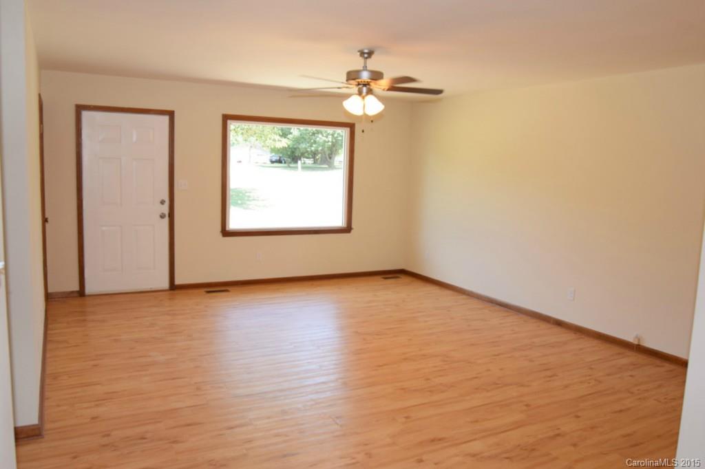 2112 Quail Ridge Road Monroe, NC 28110 - Photo 5 of 14 a view of an empty room with a window