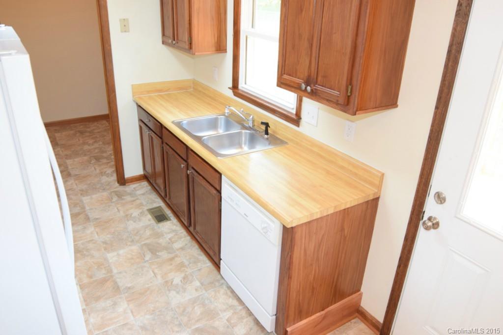 2112 Quail Ridge Road Monroe, NC 28110 - Photo 8 of 14 a bathroom with a sink and a mirror