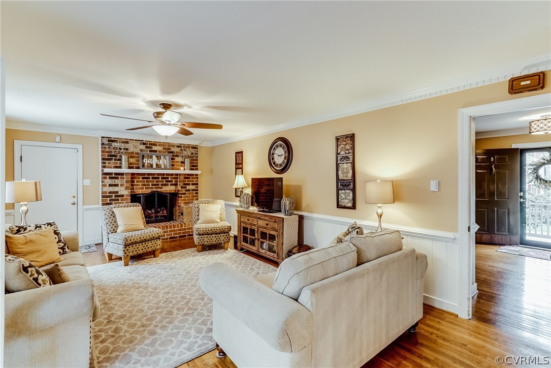 9000 Cardiff Road North Chesterfield, VA 23236 - Photo 11 of 40 a living room with furniture and a chandelier