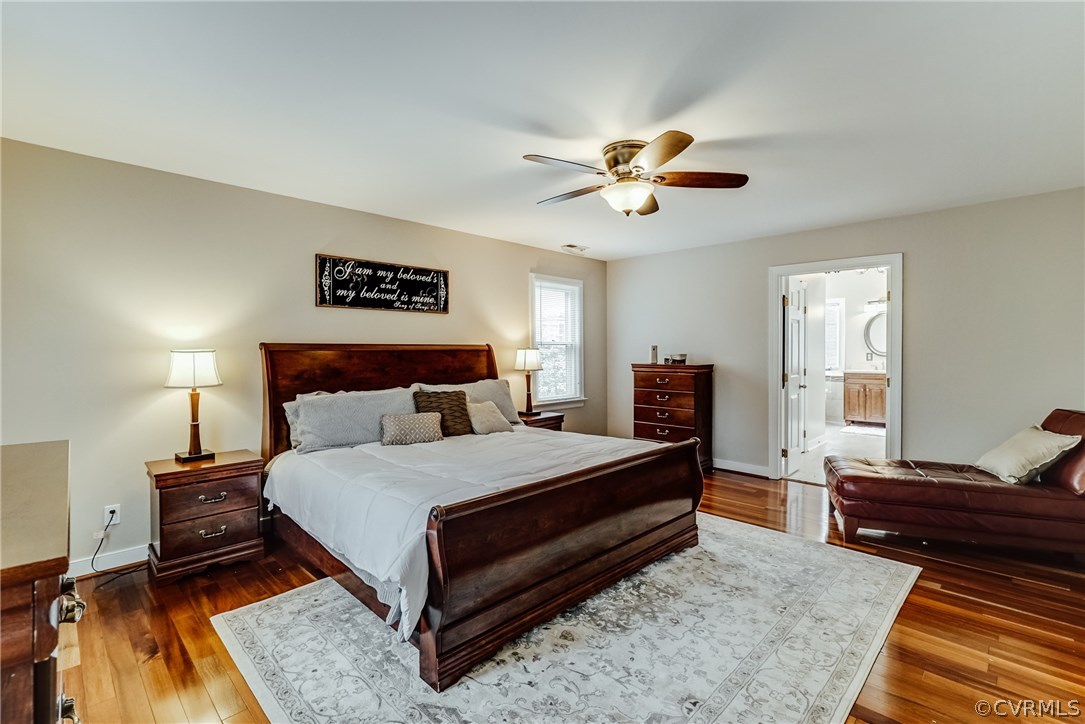 9000 Cardiff Road North Chesterfield, VA 23236 - Photo 23 of 40 a bedroom with a bed and wooden floor