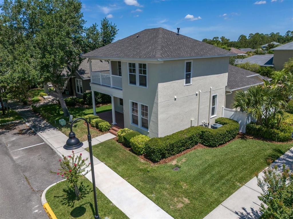 10121 Porch Street New Port Richey, FL 34655 - Photo 35 of 57 a front view of a house with a yard