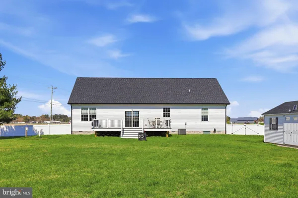 a view of a house with a big yard