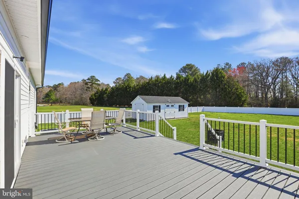 a view of a deck with chairs