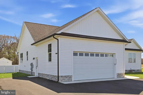 a view of a house with a garage