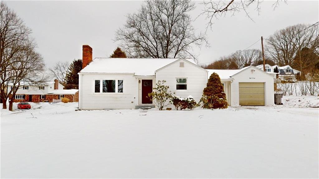 820 Sunset Drive Butler, PA 16001 - Photo 1 of 34 a view of a white house with a snow on the road