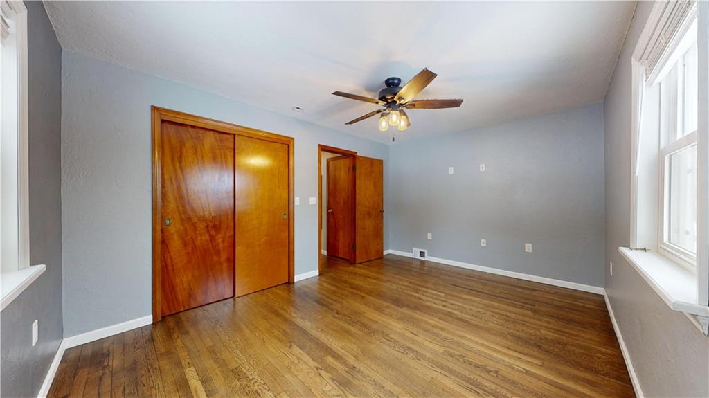 820 Sunset Drive Butler, PA 16001 - Photo 21 of 34 wooden floor in an empty room with a window