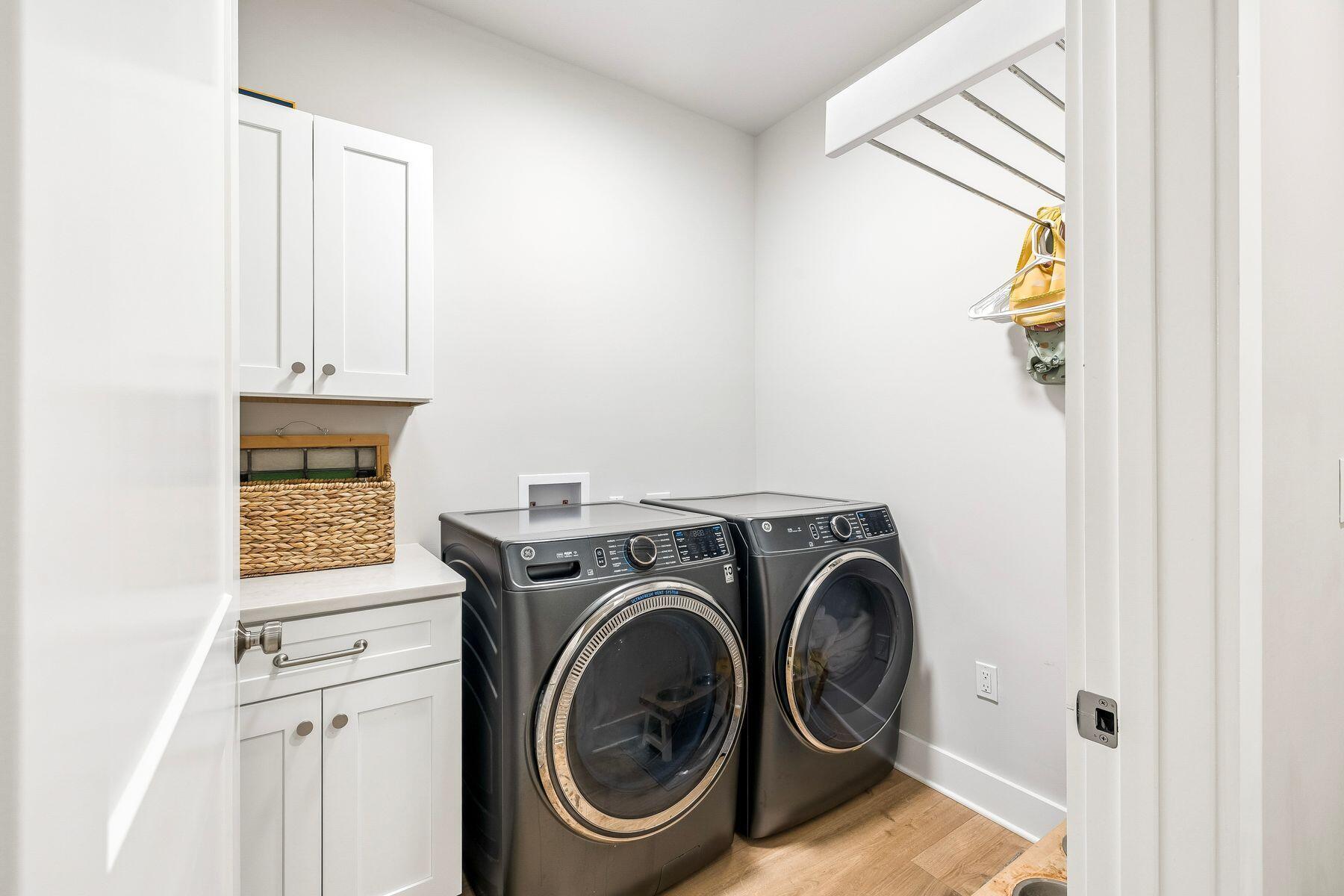 39 West Captain Fritz Way Freeport, FL 32439 - Photo 25 of 33 a view of storage and utility room with washer and dryer