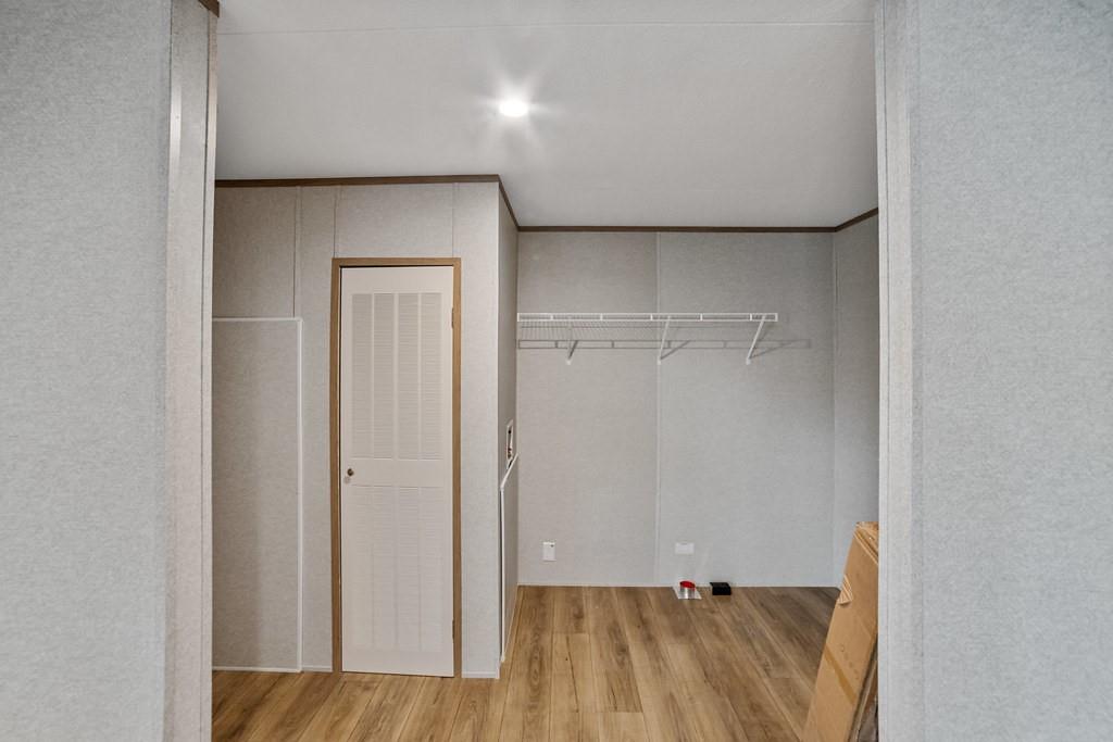 3106 Smyrna Road Sunset, TX 76270 - Photo 35 of 38 a view of room with wooden floor