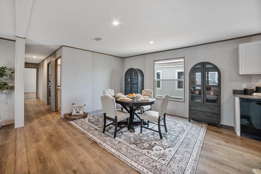 3106 Smyrna Road Sunset, TX 76270 - Photo 7 of 38 a view of a livingroom with furniture and wooden floor