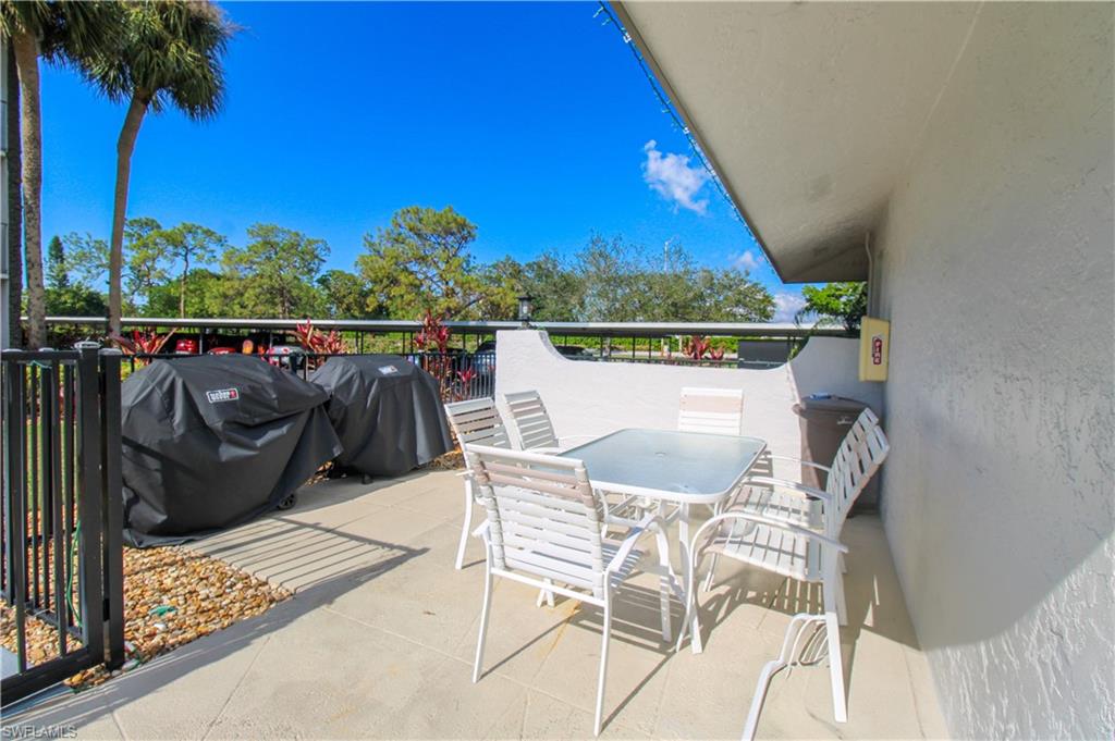 5635 Rattlesnake Hammock Road, Unit 102D Naples, FL 34113 - Photo 15 of 47 a view of balcony and deck