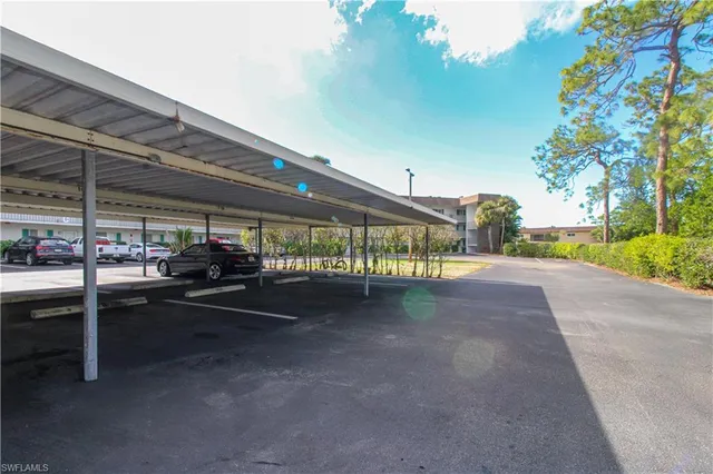 a view of a street with cars