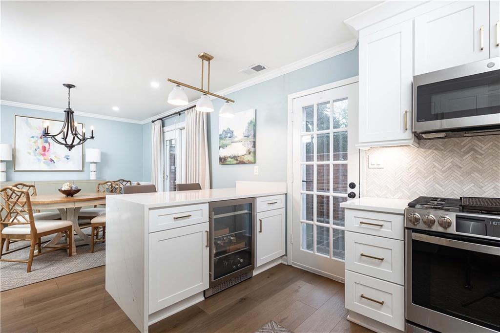 5 Middle Plantation Road Northwest, Unit 5 Atlanta, GA 30318 - Photo 14 of 33 a kitchen with a stove oven and sink