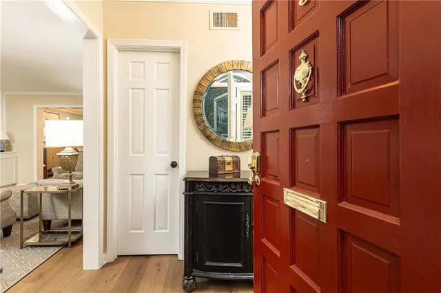 a kitchen with a refrigerator and a stove