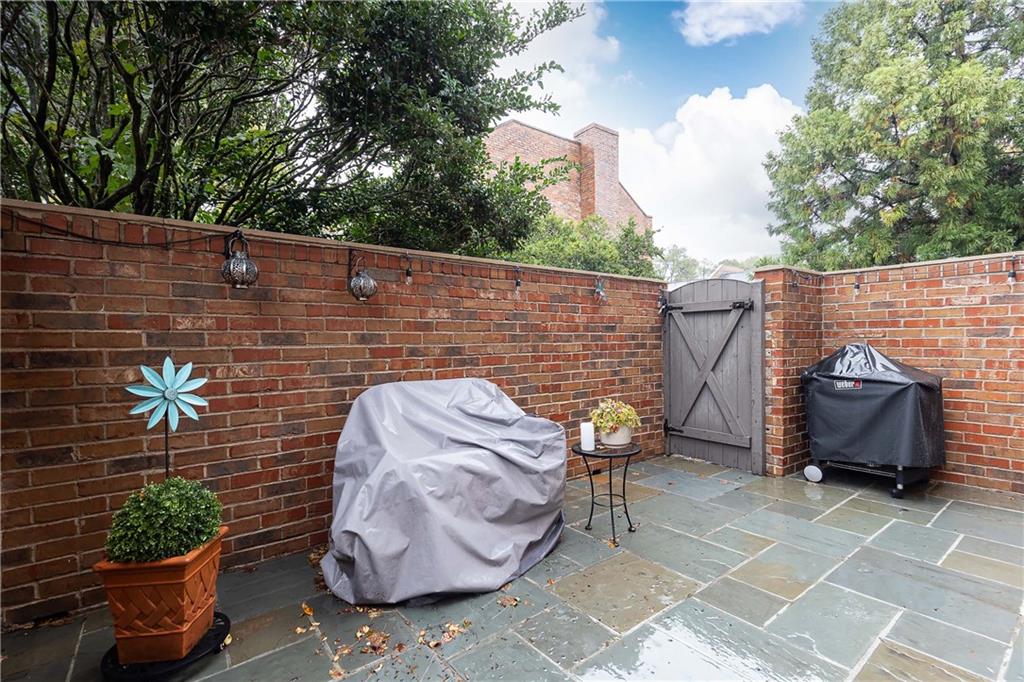 5 Middle Plantation Road Northwest, Unit 5 Atlanta, GA 30318 - Photo 31 of 33 a view of patio with couple of furniture