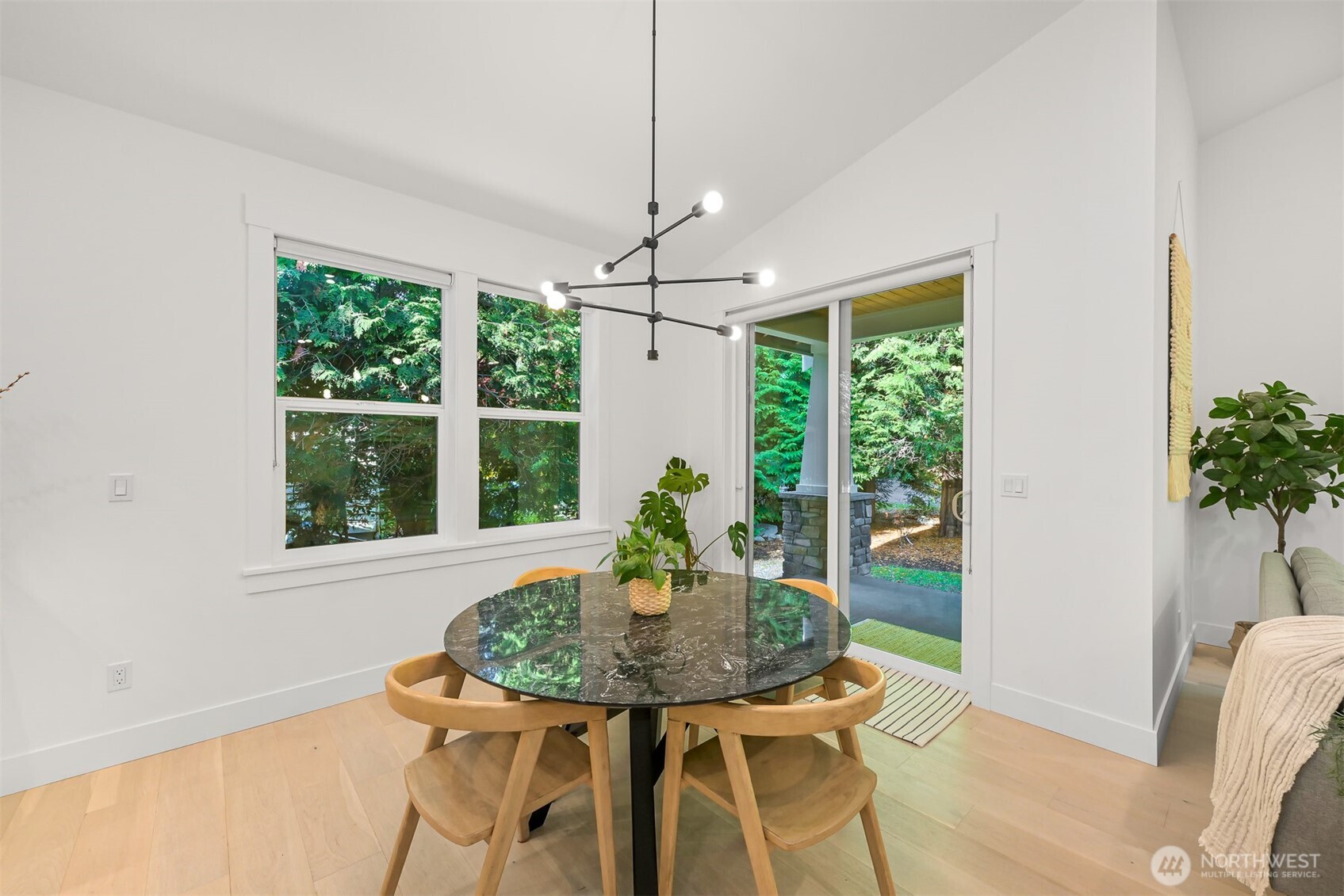 5440 Tanager Road Blaine, WA 98230 - Photo 13 of 40 a view of a dining room with furniture window and outside view