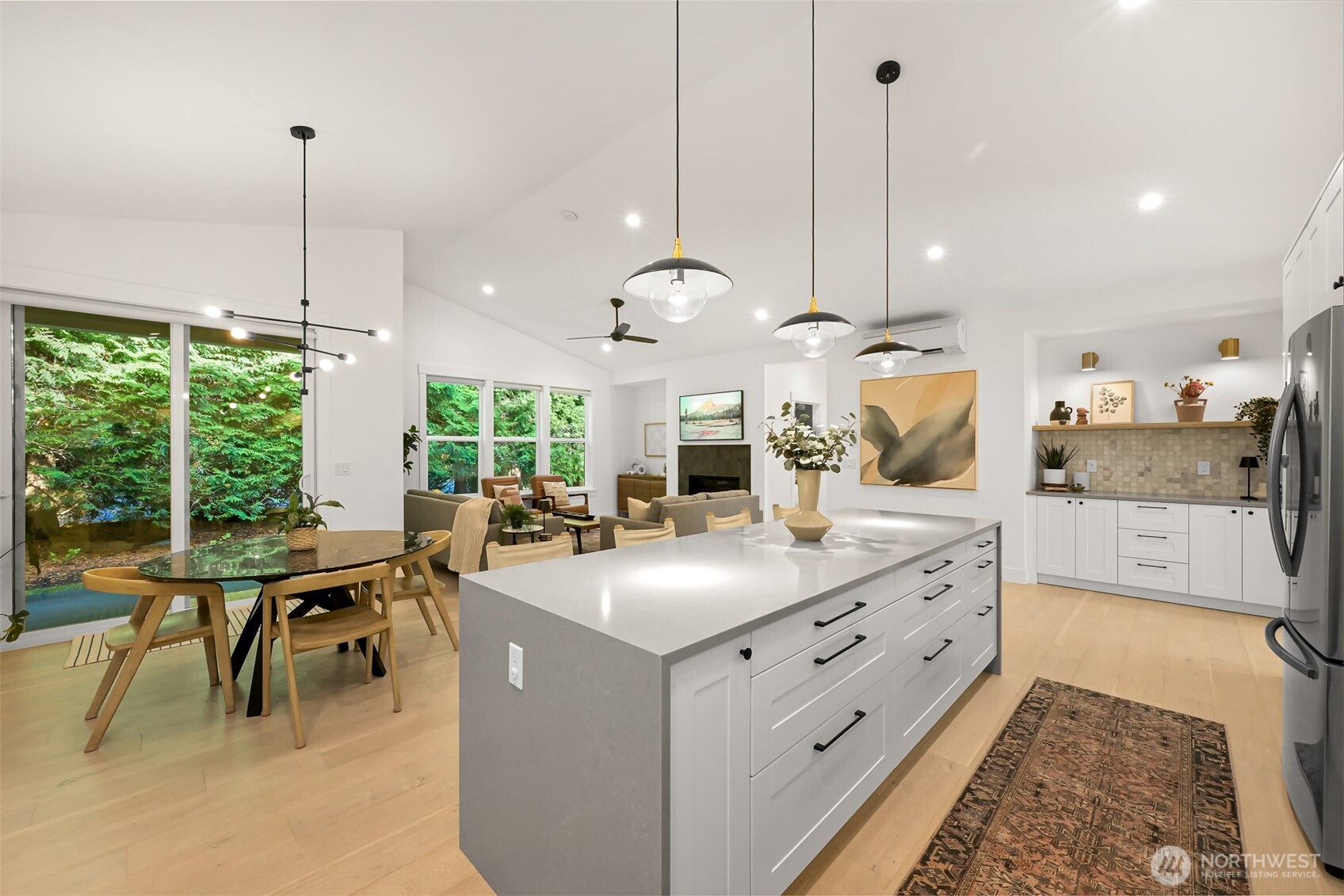 5440 Tanager Road Blaine, WA 98230 - Photo 18 of 40 a view of center kitchen island with furniture and floor
