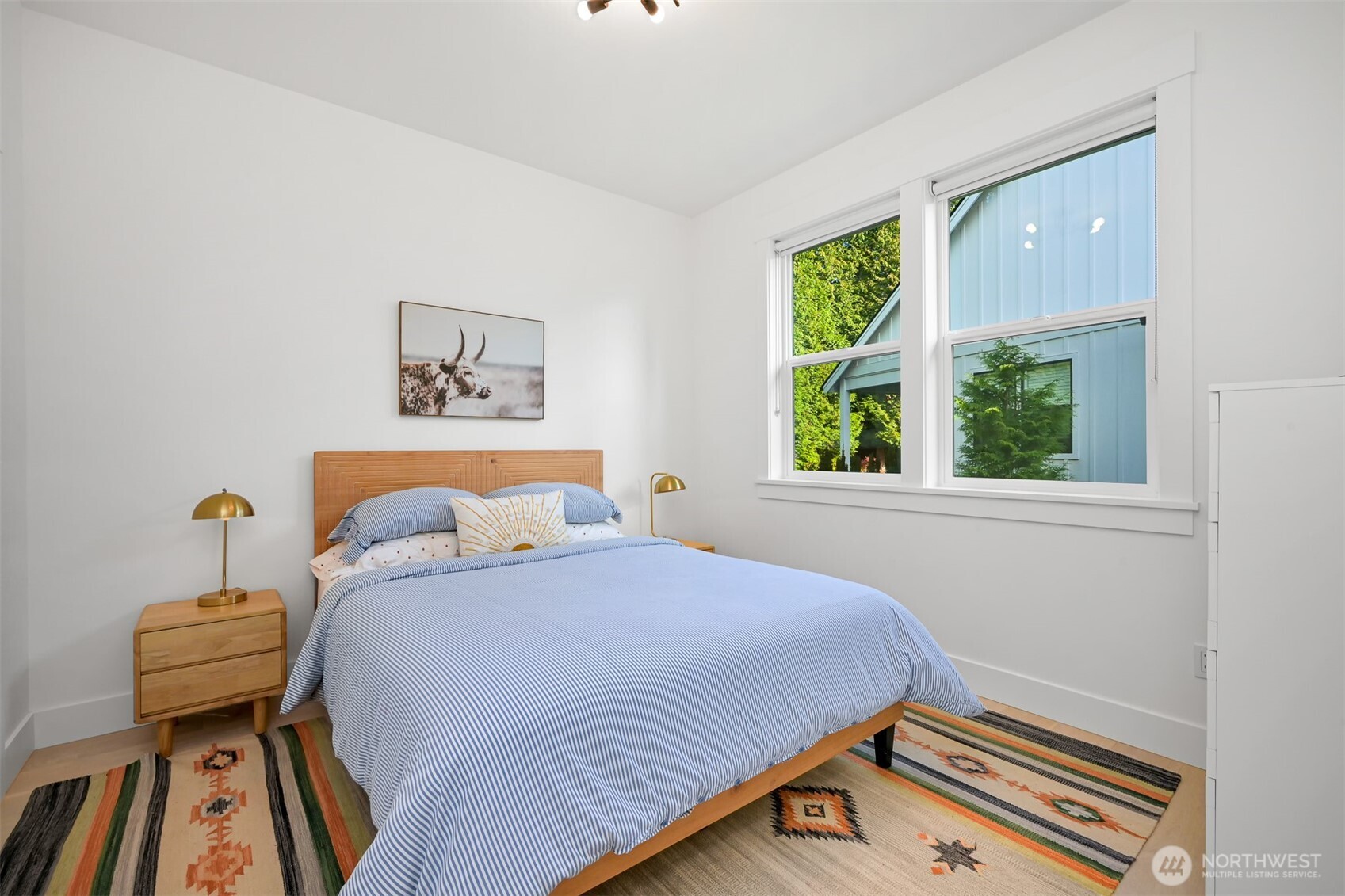 5440 Tanager Road Blaine, WA 98230 - Photo 27 of 40 a bedroom with a bed and a window