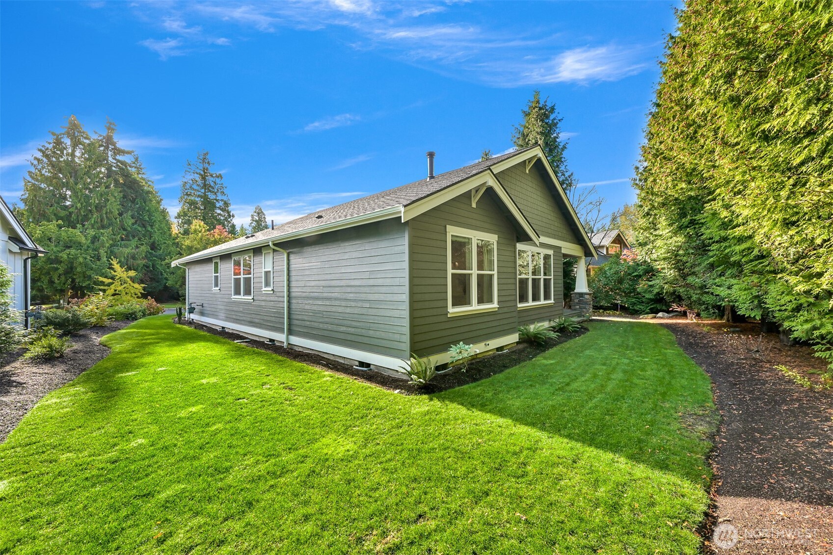 5440 Tanager Road Blaine, WA 98230 - Photo 32 of 40 a view of a house with a yard