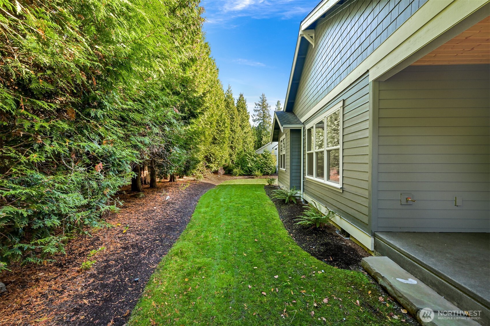5440 Tanager Road Blaine, WA 98230 - Photo 34 of 40 a view of back yard of the house