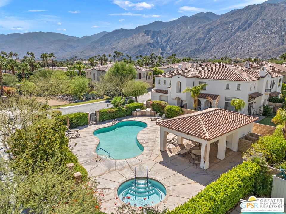 491 Terra Vita Palm Springs, CA 92262 - Photo 1 of 25 an aerial view of multiple house with a yard