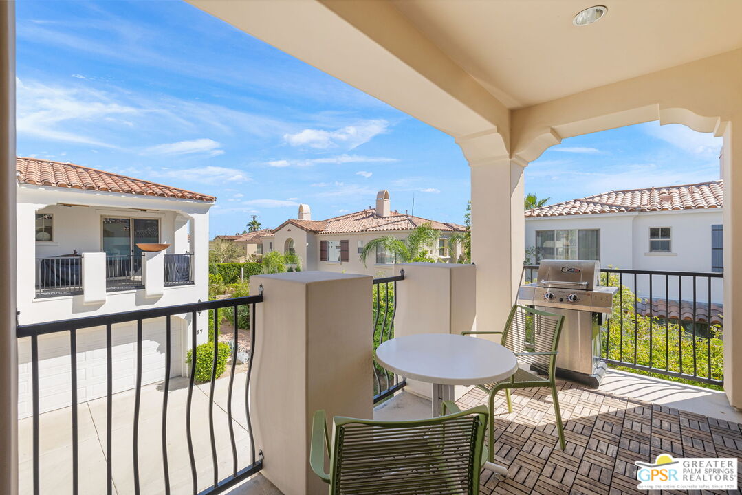 491 Terra Vita Palm Springs, CA 92262 - Photo 16 of 25 a view of a chairs and table in the balcony