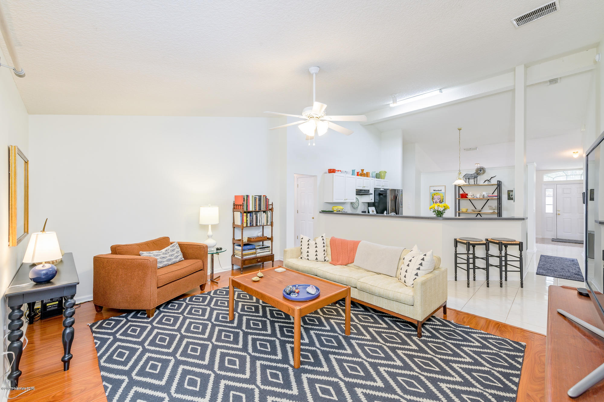 1261 Ribbon Road Jacksonville, FL 32259 - Photo 13 of 33 a living room with lots of furniture and a rug