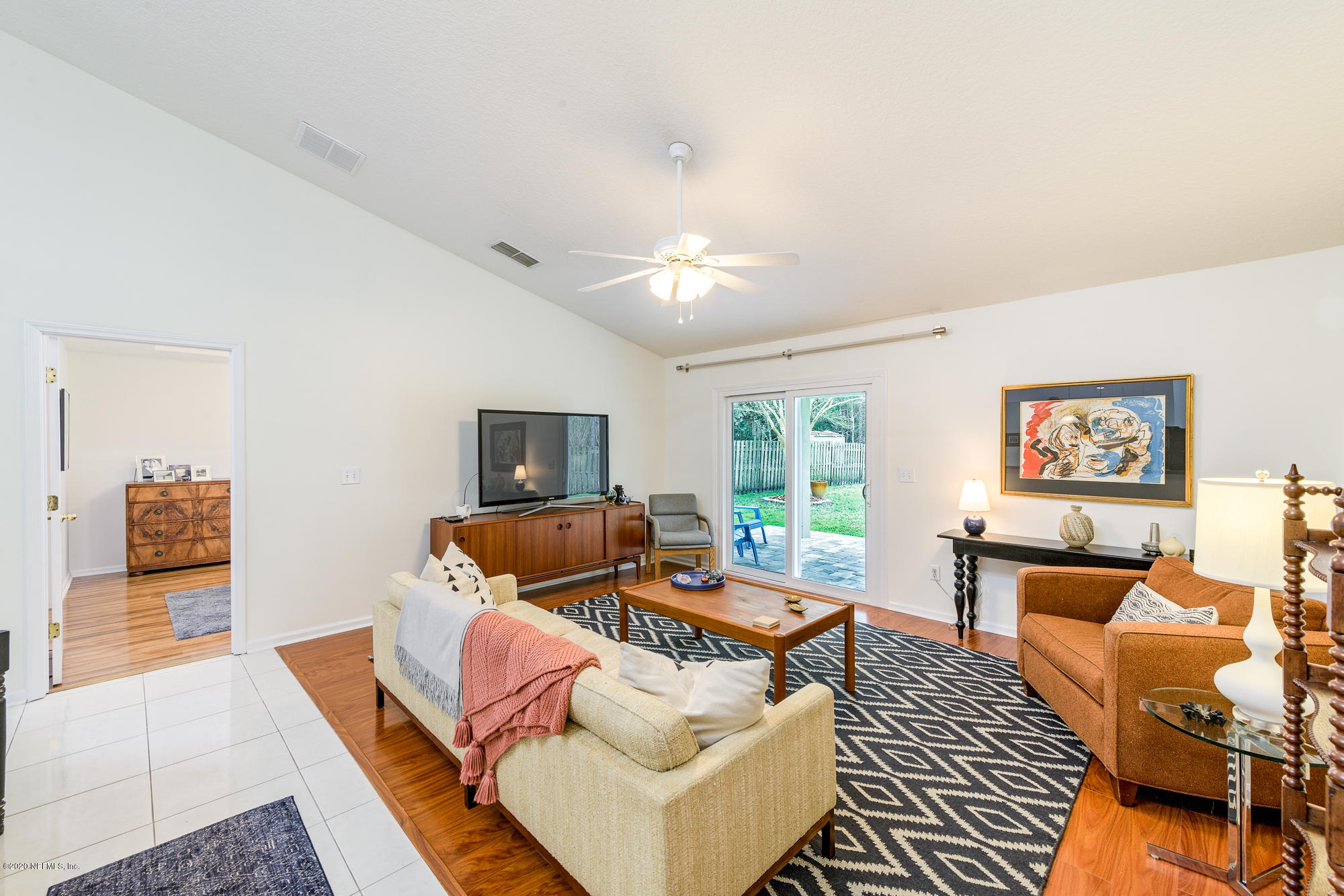 1261 Ribbon Road Jacksonville, FL 32259 - Photo 15 of 33 a living room with furniture and a flat screen tv