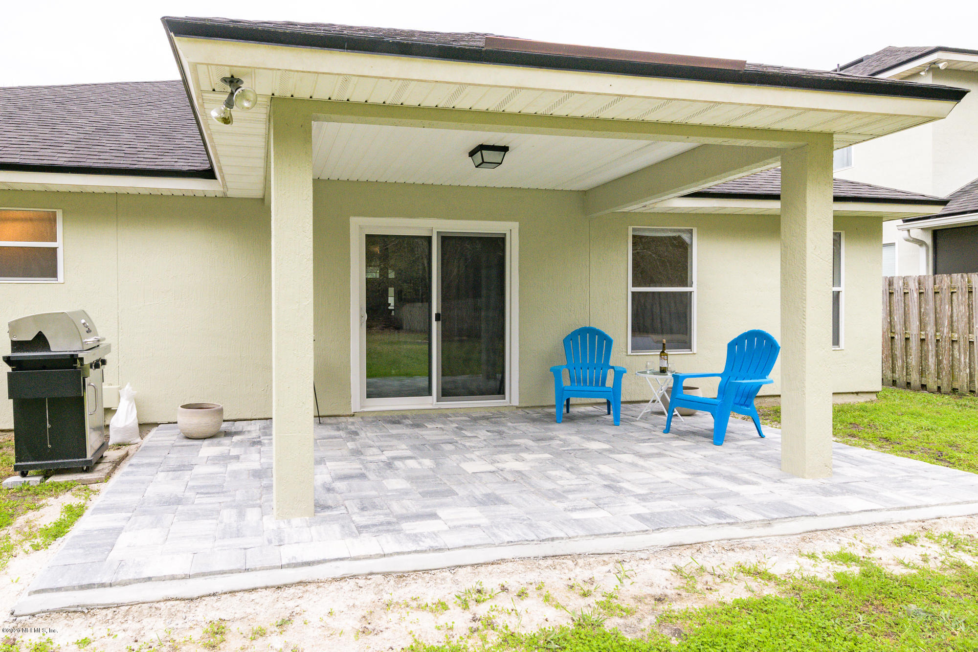 1261 Ribbon Road Jacksonville, FL 32259 - Photo 23 of 33 a front view of a house with a patio