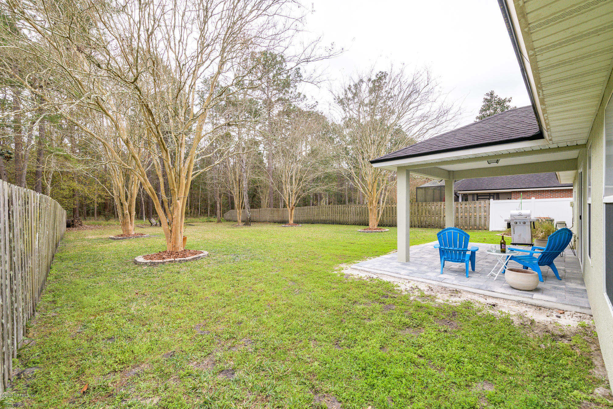 1261 Ribbon Road Jacksonville, FL 32259 - Photo 25 of 33 a view of a house with backyard and sitting area