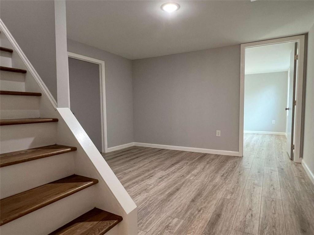 3158 Shabromat Way Atlanta, GA 30341 - Photo 11 of 47 wooden floor in an empty room