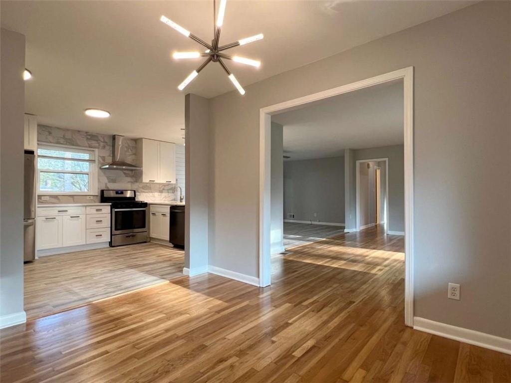 3158 Shabromat Way Atlanta, GA 30341 - Photo 13 of 47 a view of a kitchen with wooden floor and a kitchen