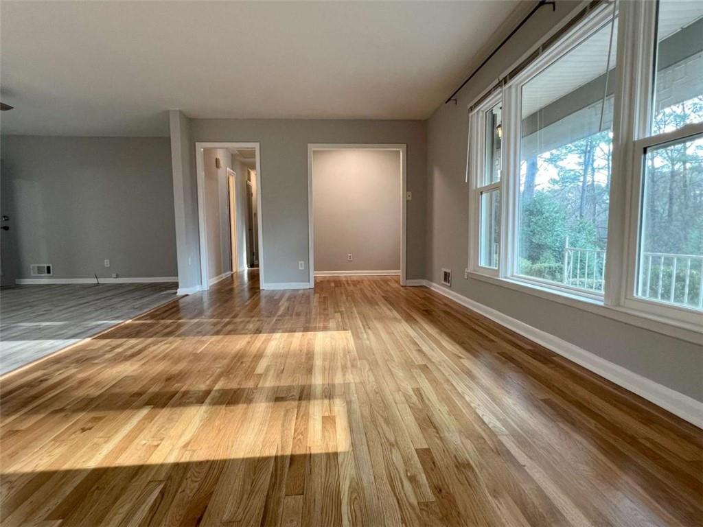 3158 Shabromat Way Atlanta, GA 30341 - Photo 23 of 47 a view of a room with wooden floor and windows