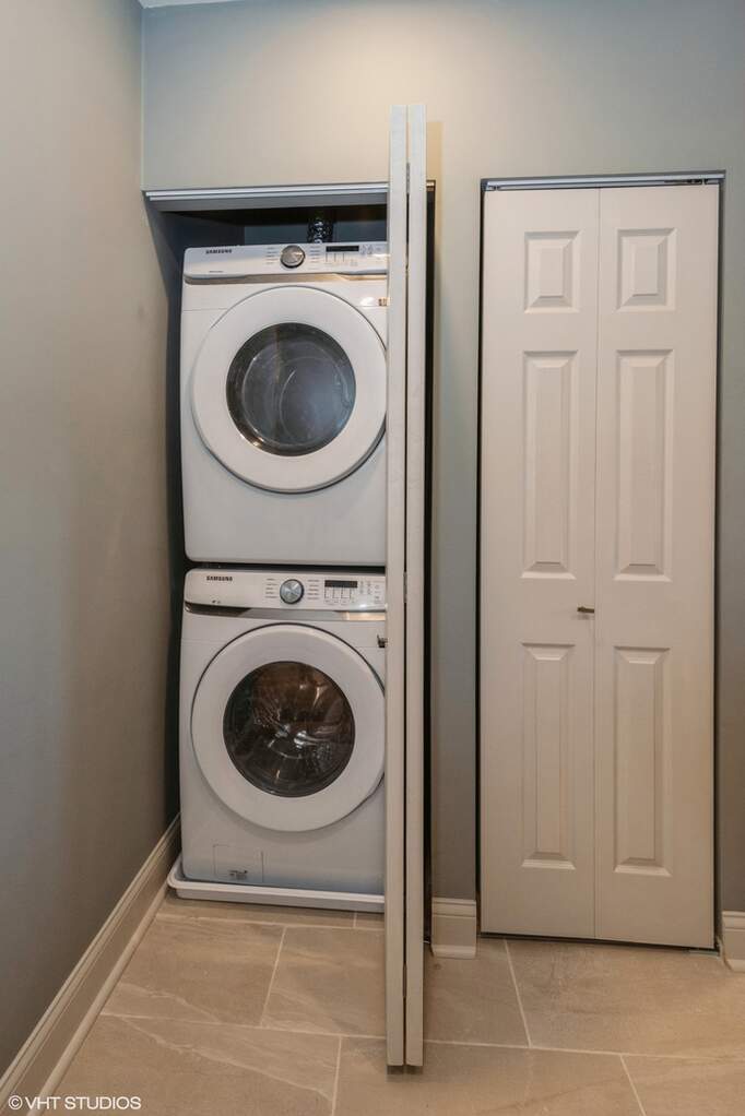 1446 West Irving Park Road, Unit 2 Chicago, IL 60613 - Photo 19 of 23 a utility room with dryer and washer